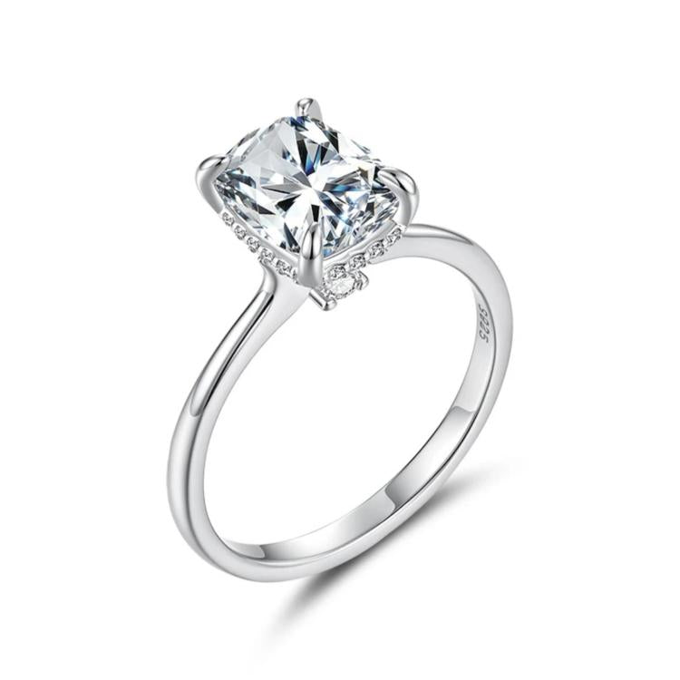 Sterling silver four-prong moissanite ring with large square center stone and polished shank