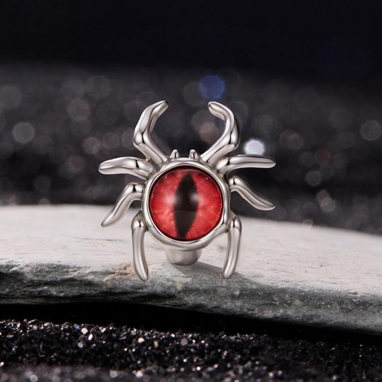 Sterling silver spider bead with red eye cabochon, raised legs and rounded bezel