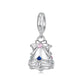 Sterling silver Christmas charm bead with pink center stone and blue accents