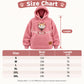 Pink fleece pet hoodie with hood and front pouch, cat peeking from opening