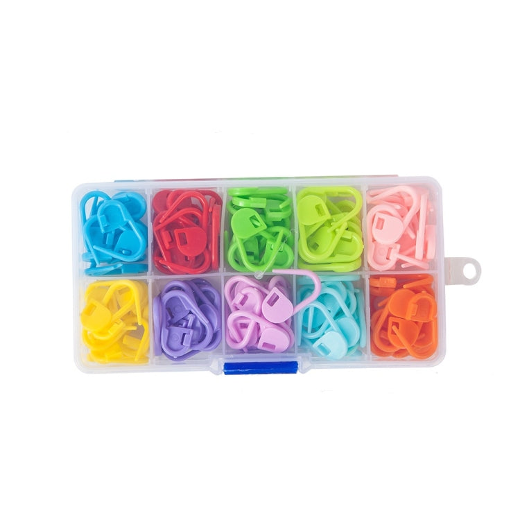 Plastic pin mark clips in clear storage case with blue latch, multicolor set