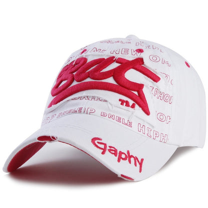 White baseball cap with red embroidered letters and curved brim, adjustable strap