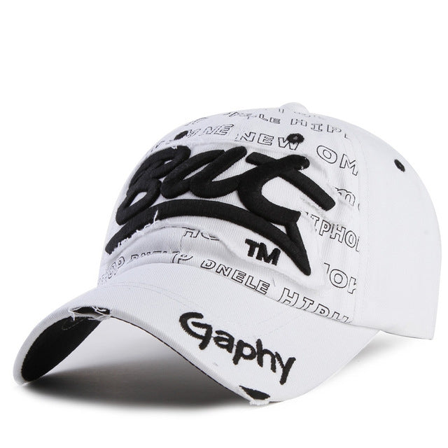 White baseball cap with black embroidered letter pattern and curved brim