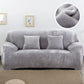 Grey plush sofa slipcover with elastic fit, thick velvety texture