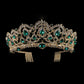 Gold rhinestone tiara crown with green gem accents and combs