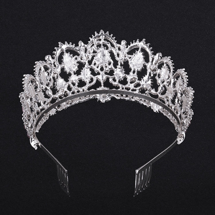 Silver rhinestone tiara crown with ornate cutout details and combs