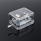 Clear acrylic DIY music box showing front-side gearing and crank handle, 3/4 view