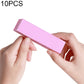 Pink nail sanding/buffing block foam rectangle, held between fingers