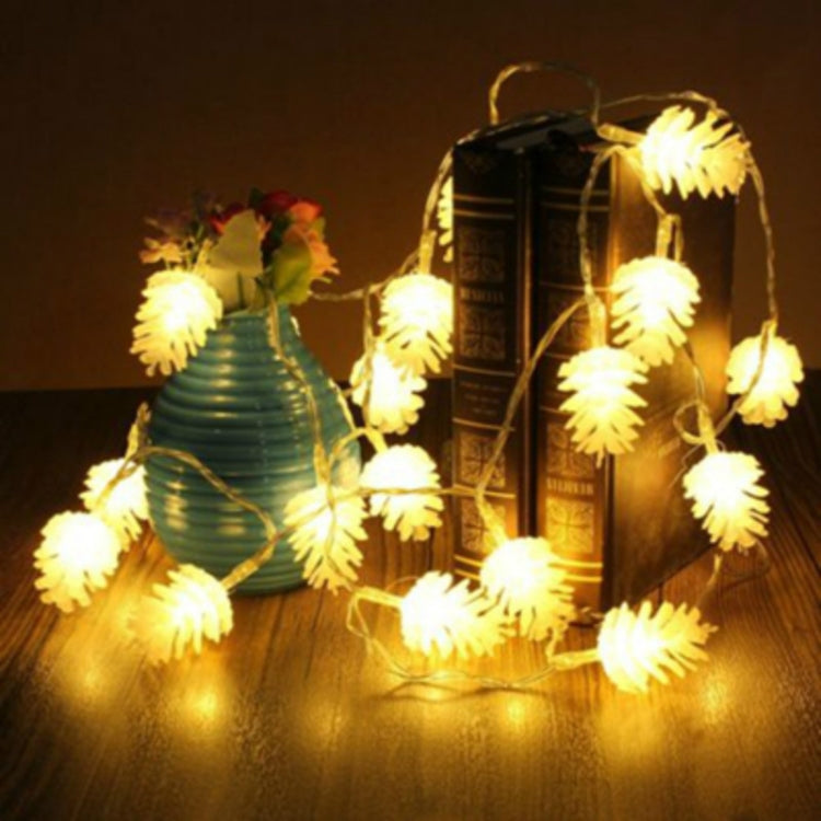 Warm white pine cone LED string lights with bright glowing bulb clusters on a strand