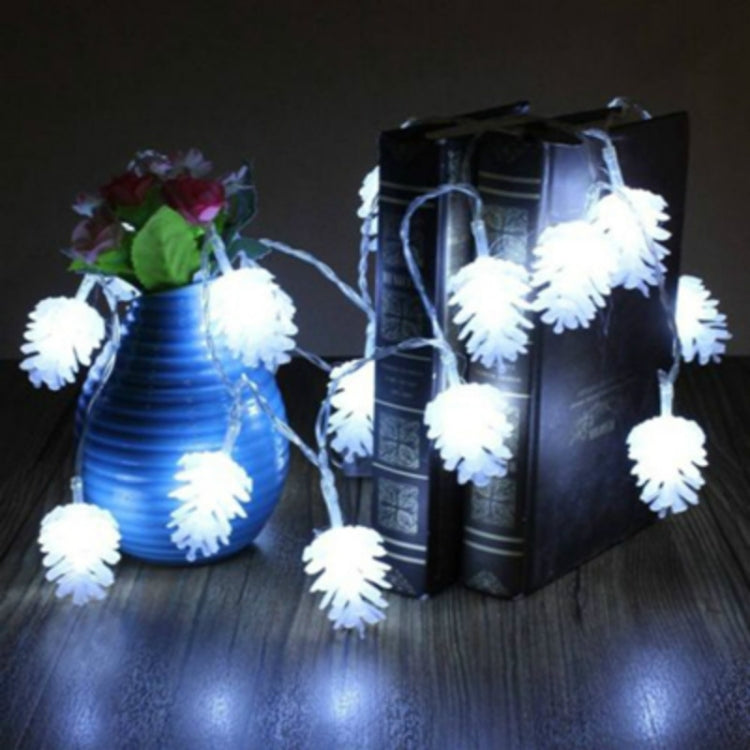 Cool white pine cone LED string lights with icy glow bulbs on a connected wire