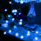 Blue pine cone LED string lights with bright blue glowing bulbs on a single strand