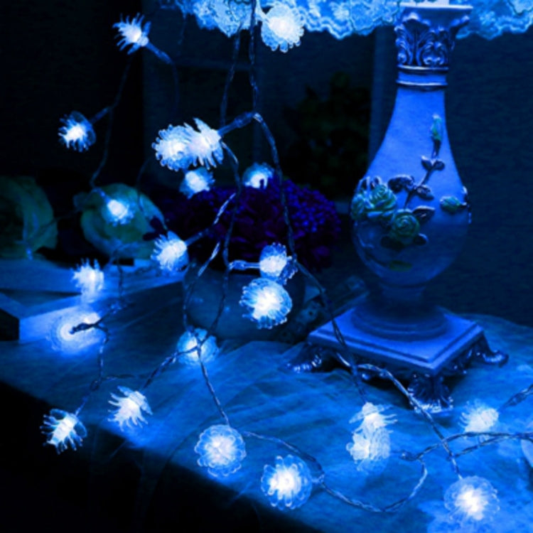 Blue pine cone LED string lights with bright blue glowing bulbs on a single strand