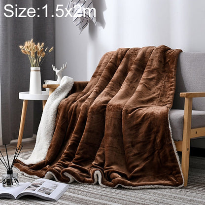 Double-thick sofa blanket in dark brown plush fleece, draped over a chair