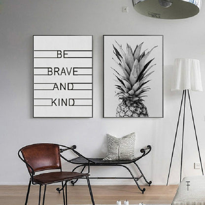 Two-piece wall print set: 'BE BRAVE AND KIND' and black-and-white pineapple design