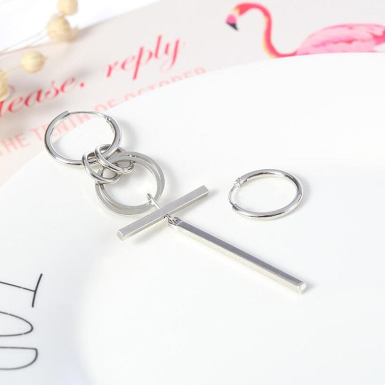 Silver-tone long asymmetric earrings with two hoop rings and a straight bar drop.