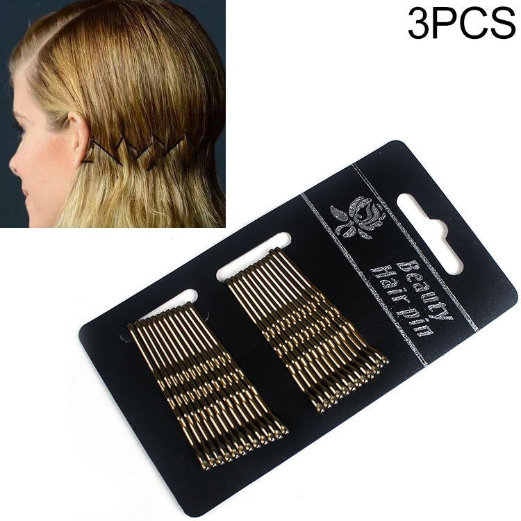 3-piece hair clip set with black and gold comb teeth on display card