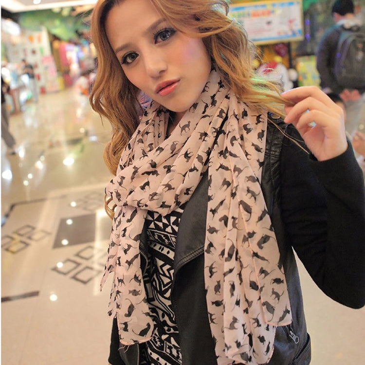 Beige cat-print chiffon scarf draped over shoulders, long lightweight fabric