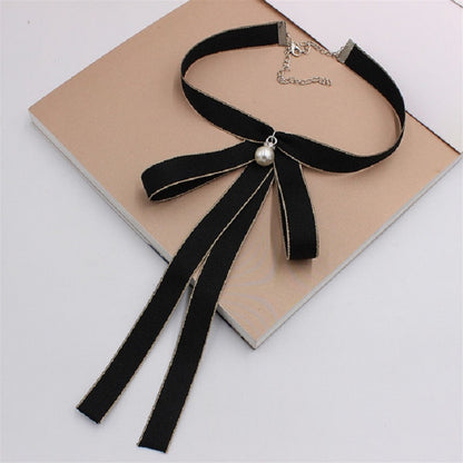 Women’s black ribbon bow tie with bow-knot, pearl center, and silver-tone chain