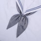 Goldfish-knot bow tie in gray with a centered knot on a white shirt collar.