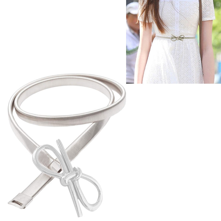 Silver elastic fine belt with bow-knot buckle and oval ring accents