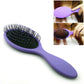 Purple hair brush with oval black bristle pad and long handle