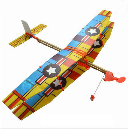 Colorful DIY rubber-powered model plane glider with orange propeller, star decals, twin wings.
