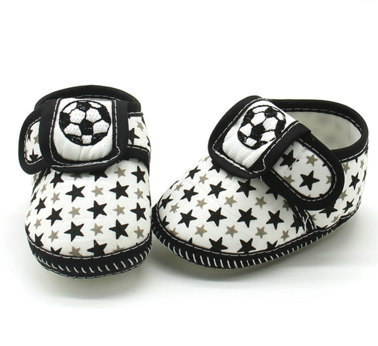 Baby prewalker shoes in black with star pattern and soccer patch, hook-and-loop strap