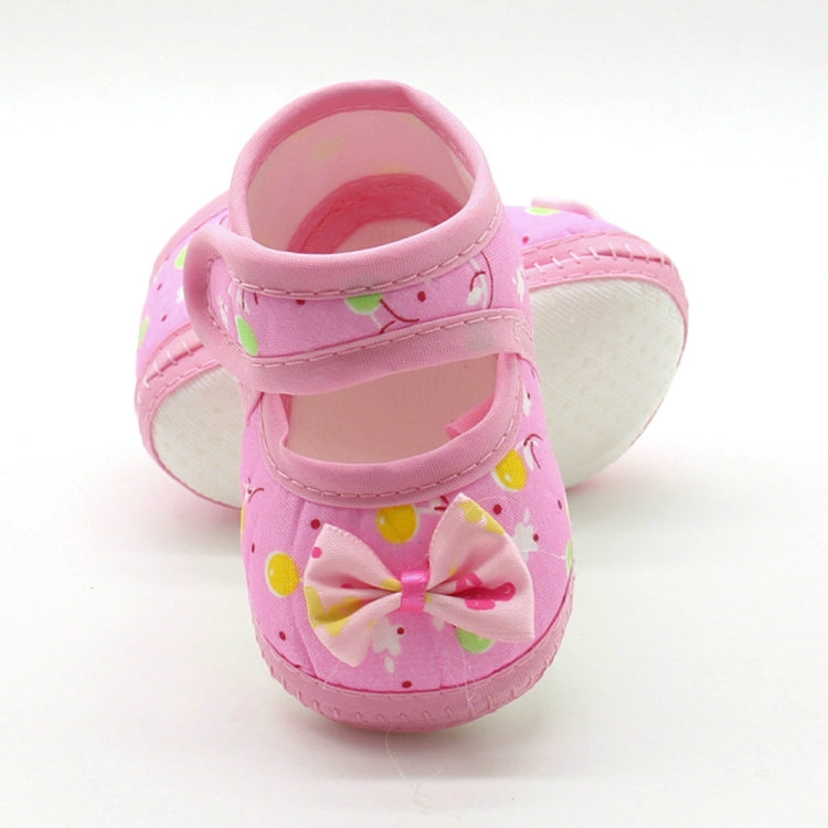 Baby prewalker shoes in pink with bow and dot print, soft sole, strap closure