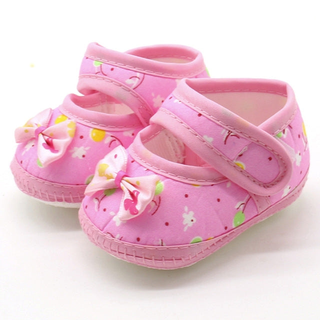 Pink baby prewalker shoes with bow detail and cute printed pattern, soft sole