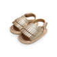Beige fringed baby sandals with hook-and-loop ankle straps and open toe