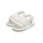 Baby fringed sandals in white PU, side view, tassel fringe across vamp
