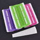 Cross-stitch thread organizers in green, purple, and pink with a white template strip