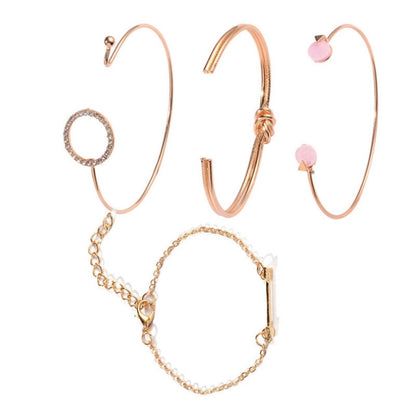 Gold-tone multilayer open crystal bracelet set with arrow and pink heart charms
