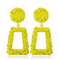 Yellow geometric trapezoid long dangle earrings with textured round tops