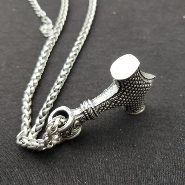 Engraved metal Viking hammer pendant on silver chain with braided links