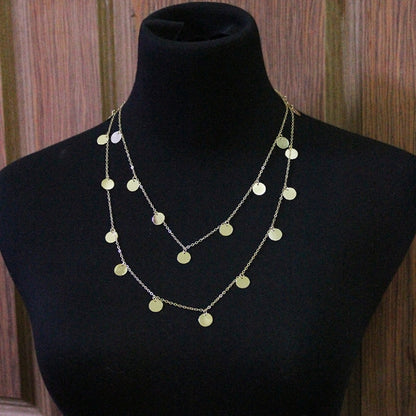 Silver-tone long necklace with layered round disc pendants and fine chain
