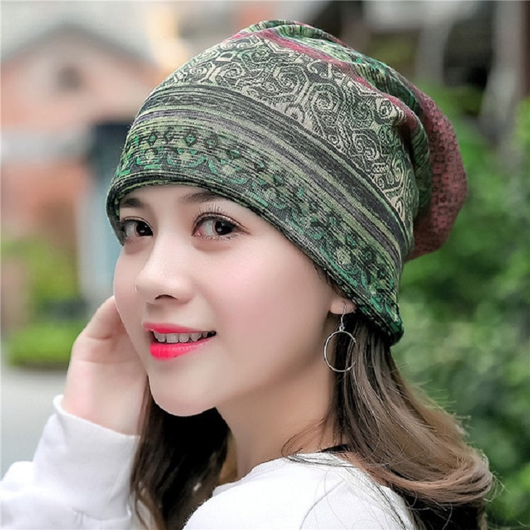 Dark green patterned cotton wrap turban hat with side knot and folded brim