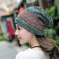 Teal patterned cotton wrap turban hat with side knot and folded edge
