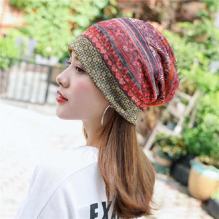Red and teal patterned cotton wrap turban hat with striped band