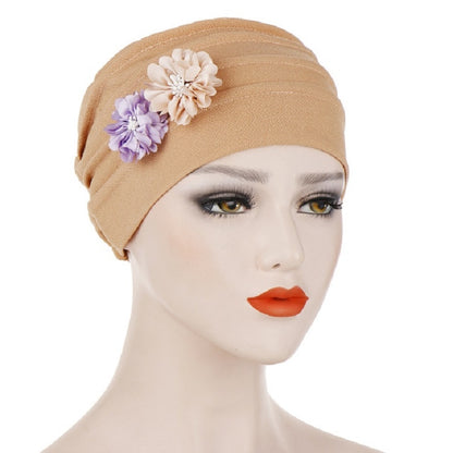 Khaki linen turban hat wrap with layered flower appliques in cream and lavender
