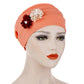 Orange linen turban hat wrap with beige and burgundy flower appliques