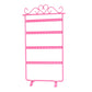Pink jewelry stand holder rack with four tier bars and curved earring hooks on top.