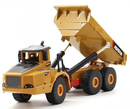 Tan alloy articulated dump truck toy with raised tipping bed and black cab