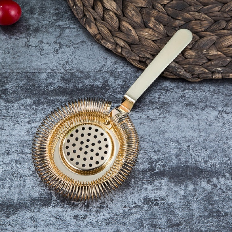 Gold bartender ice strainer with spiral mesh and perforated filter disc, long handle