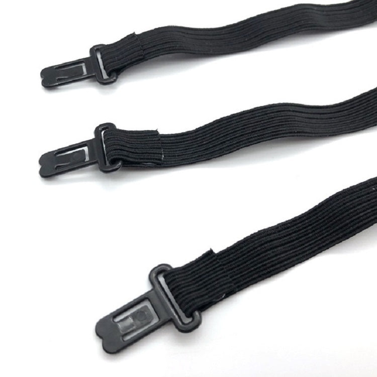 Close-up of dark bow tie straps with metal slider buckles at the ends