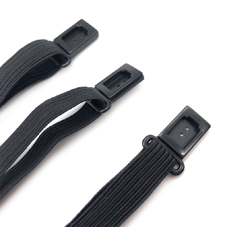 Dark bow tie strap ends with metal brackets and punched adjustment holes