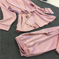 Silk-look pink robe pajama top and matching pants set with tie waist and trimmed cuffs