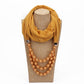 Apricot scarf with copper-gold imitation pearl necklace, multi-strand bead design