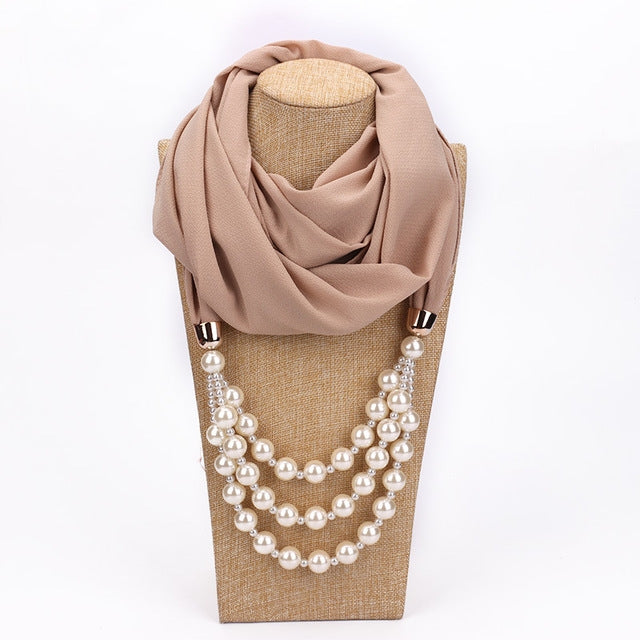 Beige scarf with white imitation pearl necklace, layered glossy round bead strands