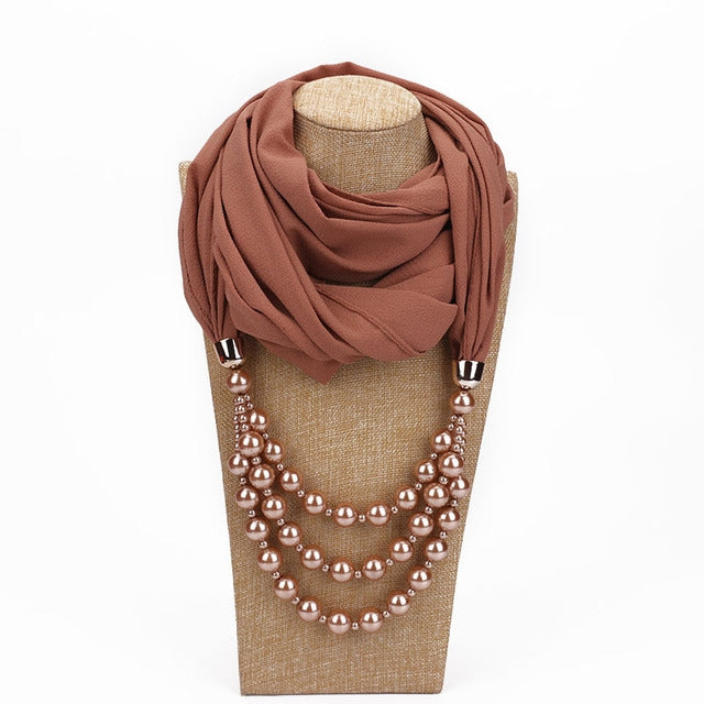 Brown scarf with imitation pearl bead necklace, layered light brown beads and pearls.